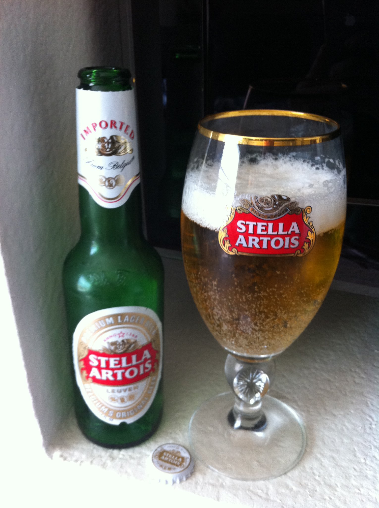 фото пива Стелла Артуа в бутылке
